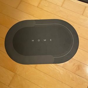 Modrnizd Magic Mat. Thin, non skid, absorbent, bathroom mat.